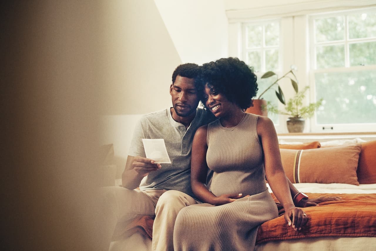 Illumina employees smiling in conversation 